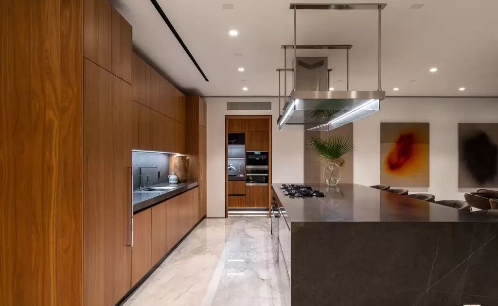 The Home in Hollywood Hills is a brand new contemporary masterpiece with unparalleled finishes and museum-quality materials now available for sale. This home located at 9410 Sierra Mar Pl, Los Angeles, California