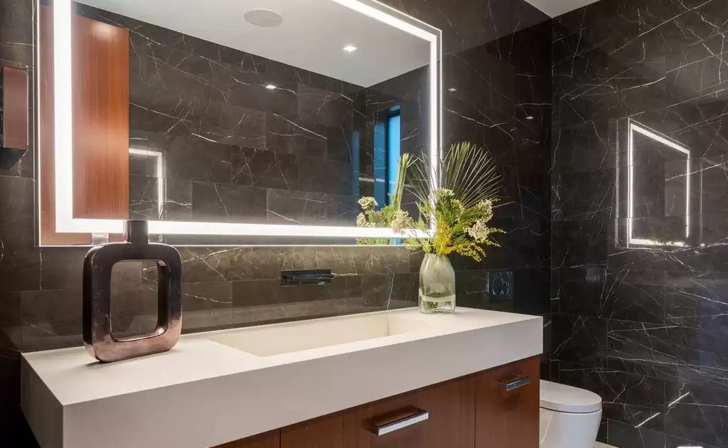 The Home in Hollywood Hills is a brand new contemporary masterpiece with unparalleled finishes and museum-quality materials now available for sale. This home located at 9410 Sierra Mar Pl, Los Angeles, California