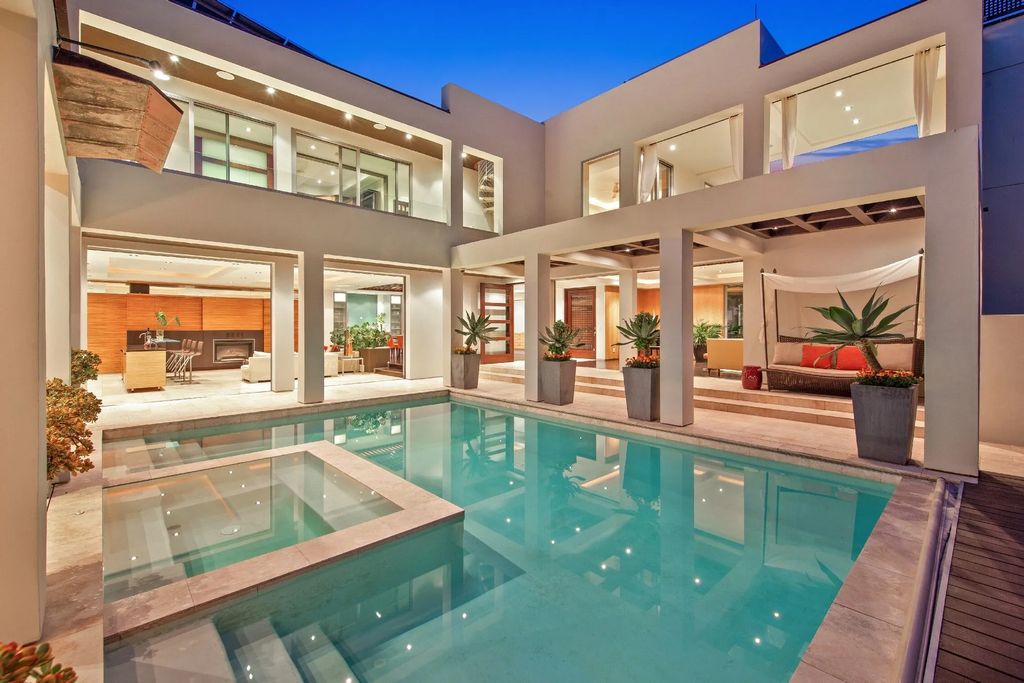 The California Seaside Home situated on one of the most spectacular beach village locations with organic and timeless design now available for sale. This home located at 1033 Loma Ave, Coronado, California