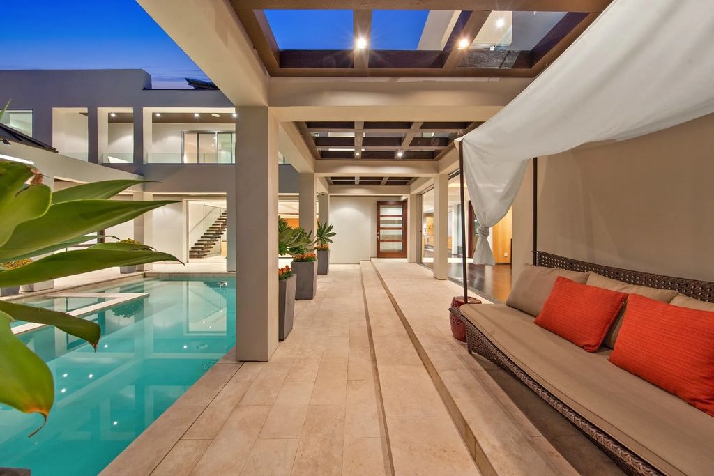 The California Seaside Home situated on one of the most spectacular beach village locations with organic and timeless design now available for sale. This home located at 1033 Loma Ave, Coronado, California