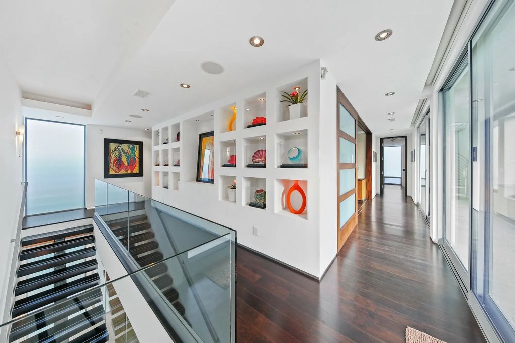 The California Seaside Home situated on one of the most spectacular beach village locations with organic and timeless design now available for sale. This home located at 1033 Loma Ave, Coronado, California