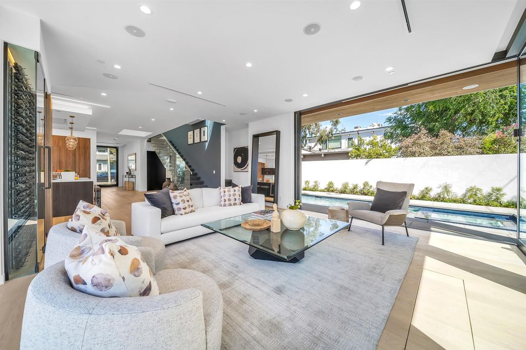 The House in Los Angeles is a brand new estate built from the ground-up with one-of-a-kind high-end features throughout now available for sale. This home located at 3547 Barry Ave, Los Angeles, California