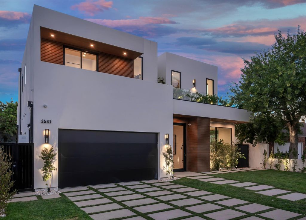 The House in Los Angeles is a brand new estate built from the ground-up with one-of-a-kind high-end features throughout now available for sale. This home located at 3547 Barry Ave, Los Angeles, California