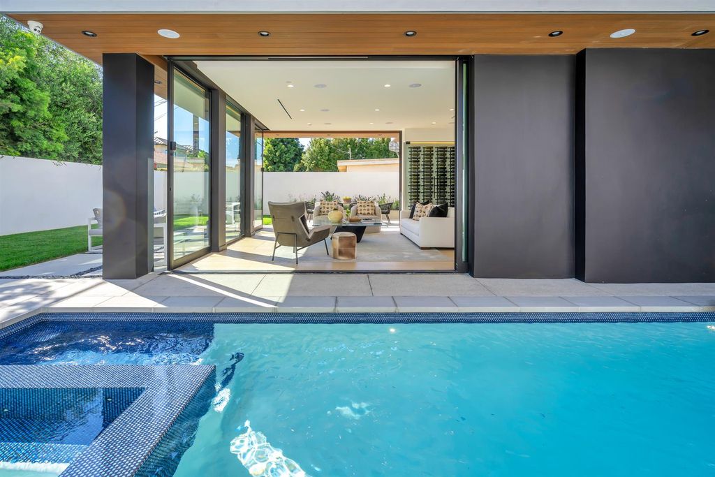 The House in Los Angeles is a brand new estate built from the ground-up with one-of-a-kind high-end features throughout now available for sale. This home located at 3547 Barry Ave, Los Angeles, California
