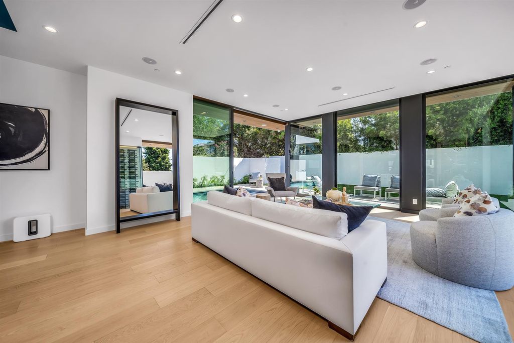 The House in Los Angeles is a brand new estate built from the ground-up with one-of-a-kind high-end features throughout now available for sale. This home located at 3547 Barry Ave, Los Angeles, California