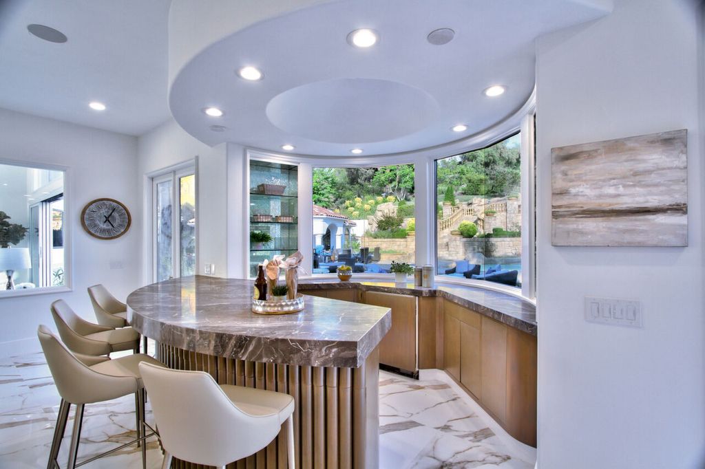 The Home in San Juan Capistrano is a luxurious gate-guarded estate where Modern European style meets contemporary design now available for sale. This home located at 28572 Paseo Zorro, San Juan Capistrano, California