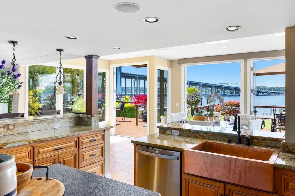 The Waterfront Home in Washington offers shimmering views of the water, city & mountains now available for sale. This home is located at 3261 Evergreen Point Rd, Medina, Washington