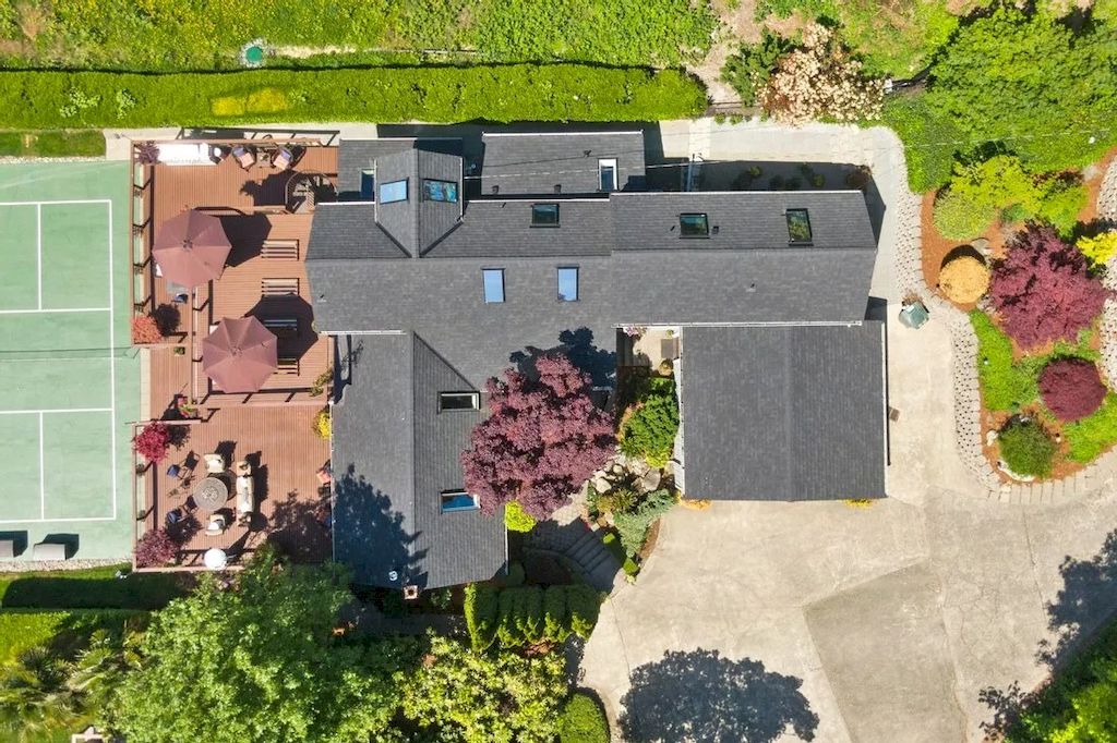 The Waterfront Home in Washington offers shimmering views of the water, city & mountains now available for sale. This home is located at 3261 Evergreen Point Rd, Medina, Washington