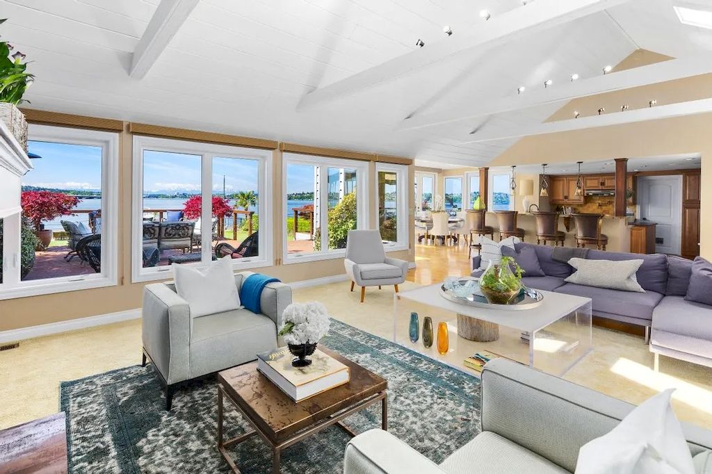 The Waterfront Home in Washington offers shimmering views of the water, city & mountains now available for sale. This home is located at 3261 Evergreen Point Rd, Medina, Washington