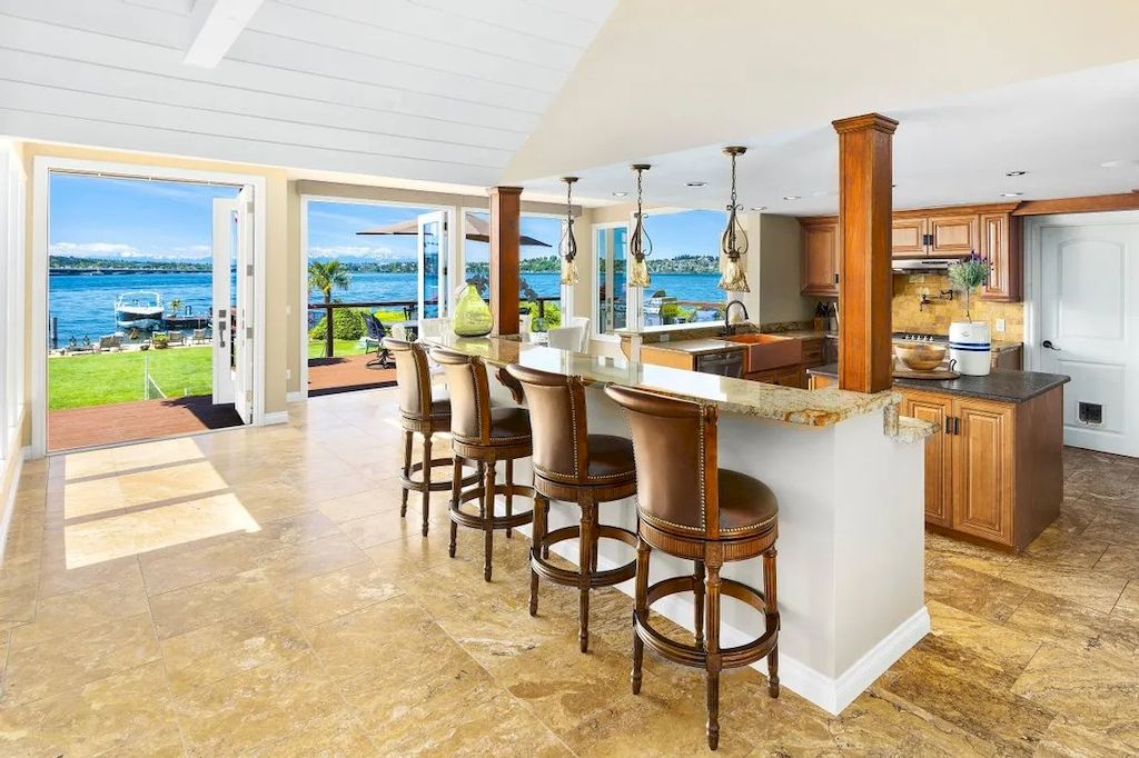 The Waterfront Home in Washington offers shimmering views of the water, city & mountains now available for sale. This home is located at 3261 Evergreen Point Rd, Medina, Washington