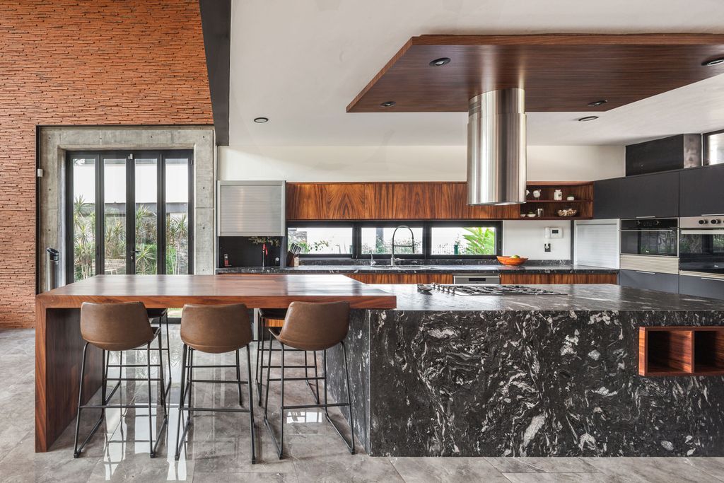 Hilca House Combines Stone Concrete Wood by Di Frenna Arquitectos 5