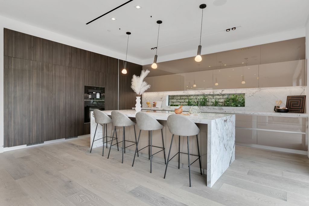 The Home in Los Angeles is a 2021 construction with exquisite Italian finishes featuring rooftop deck, basement and large lot now available for sale. This home located at 716 N Fuller Ave, Los Angeles, California