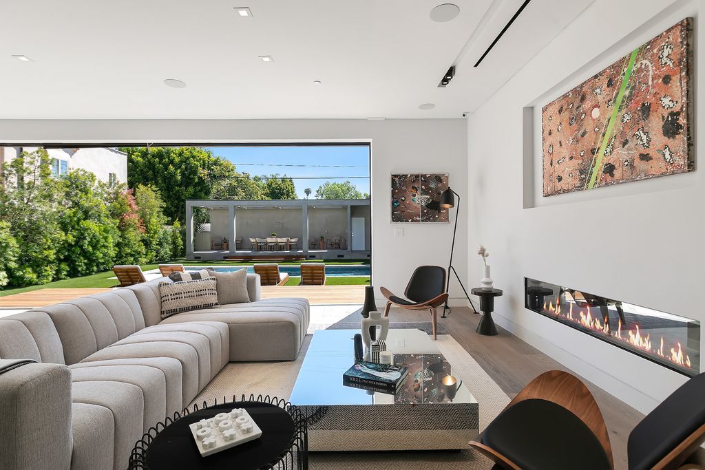 The Home in Los Angeles is a 2021 construction with exquisite Italian finishes featuring rooftop deck, basement and large lot now available for sale. This home located at 716 N Fuller Ave, Los Angeles, California