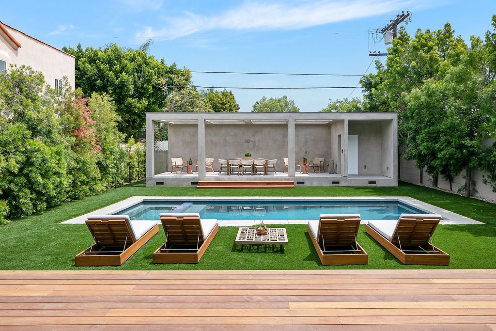 The Home in Los Angeles is a 2021 construction with exquisite Italian finishes featuring rooftop deck, basement and large lot now available for sale. This home located at 716 N Fuller Ave, Los Angeles, California