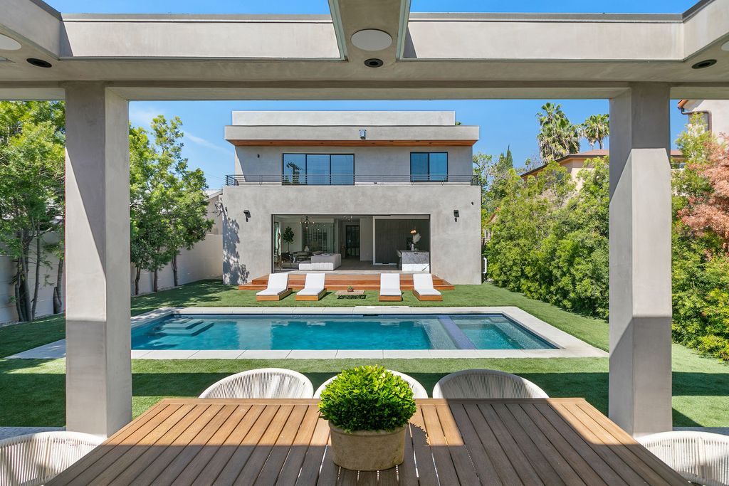 The Home in Los Angeles is a 2021 construction with exquisite Italian finishes featuring rooftop deck, basement and large lot now available for sale. This home located at 716 N Fuller Ave, Los Angeles, California