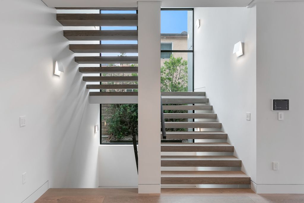 The Home in Los Angeles is a 2021 construction with exquisite Italian finishes featuring rooftop deck, basement and large lot now available for sale. This home located at 716 N Fuller Ave, Los Angeles, California