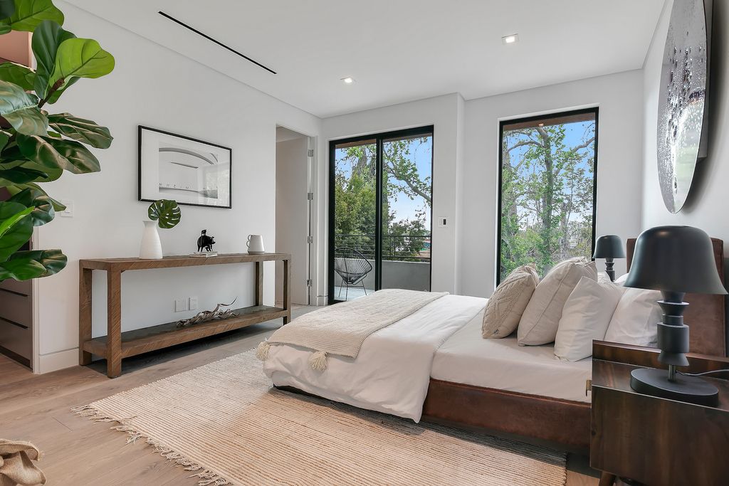 The Home in Los Angeles is a 2021 construction with exquisite Italian finishes featuring rooftop deck, basement and large lot now available for sale. This home located at 716 N Fuller Ave, Los Angeles, California