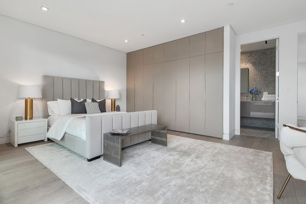 The Home in Los Angeles is a 2021 construction with exquisite Italian finishes featuring rooftop deck, basement and large lot now available for sale. This home located at 716 N Fuller Ave, Los Angeles, California