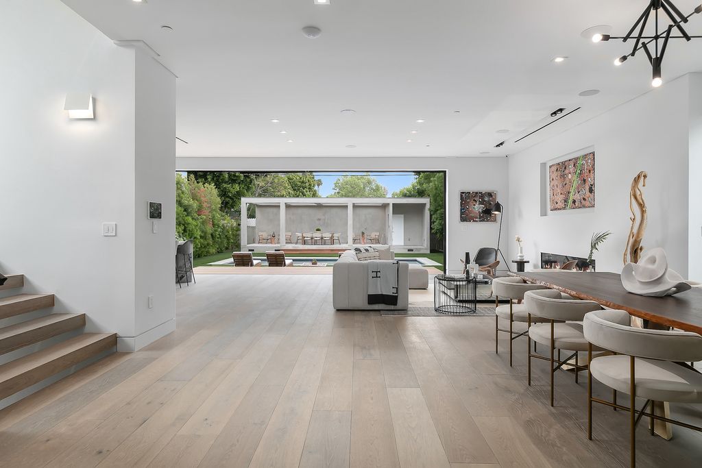 The Home in Los Angeles is a 2021 construction with exquisite Italian finishes featuring rooftop deck, basement and large lot now available for sale. This home located at 716 N Fuller Ave, Los Angeles, California