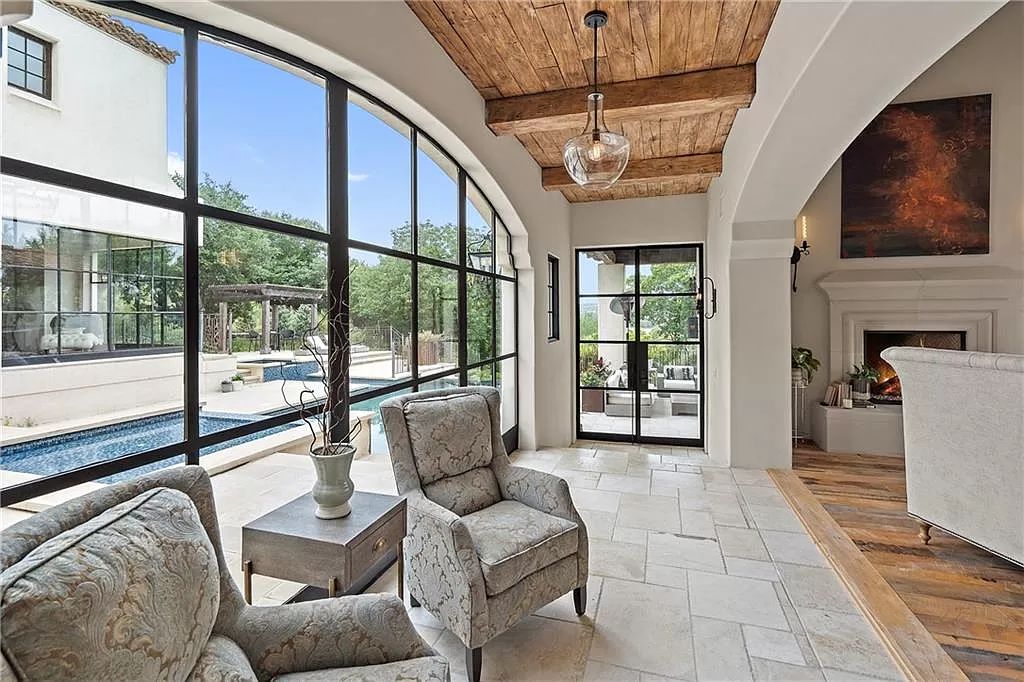 The Home in Austin is an incredible modern Santa Barbara resort style property with panoramic views of the hill country now available for sale. This home located at 4716 Pecan Chase, Austin, Texas
