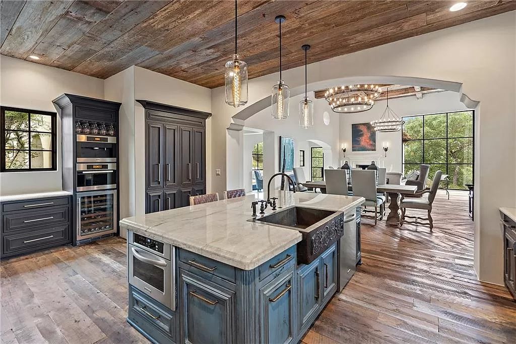 The Home in Austin is an incredible modern Santa Barbara resort style property with panoramic views of the hill country now available for sale. This home located at 4716 Pecan Chase, Austin, Texas