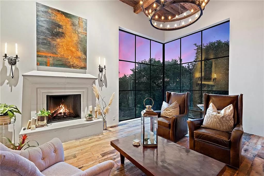 The Home in Austin is an incredible modern Santa Barbara resort style property with panoramic views of the hill country now available for sale. This home located at 4716 Pecan Chase, Austin, Texas