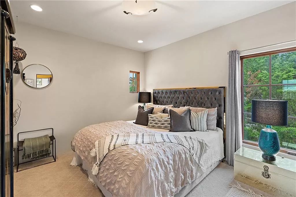 The Home in Austin is an incredible modern Santa Barbara resort style property with panoramic views of the hill country now available for sale. This home located at 4716 Pecan Chase, Austin, Texas