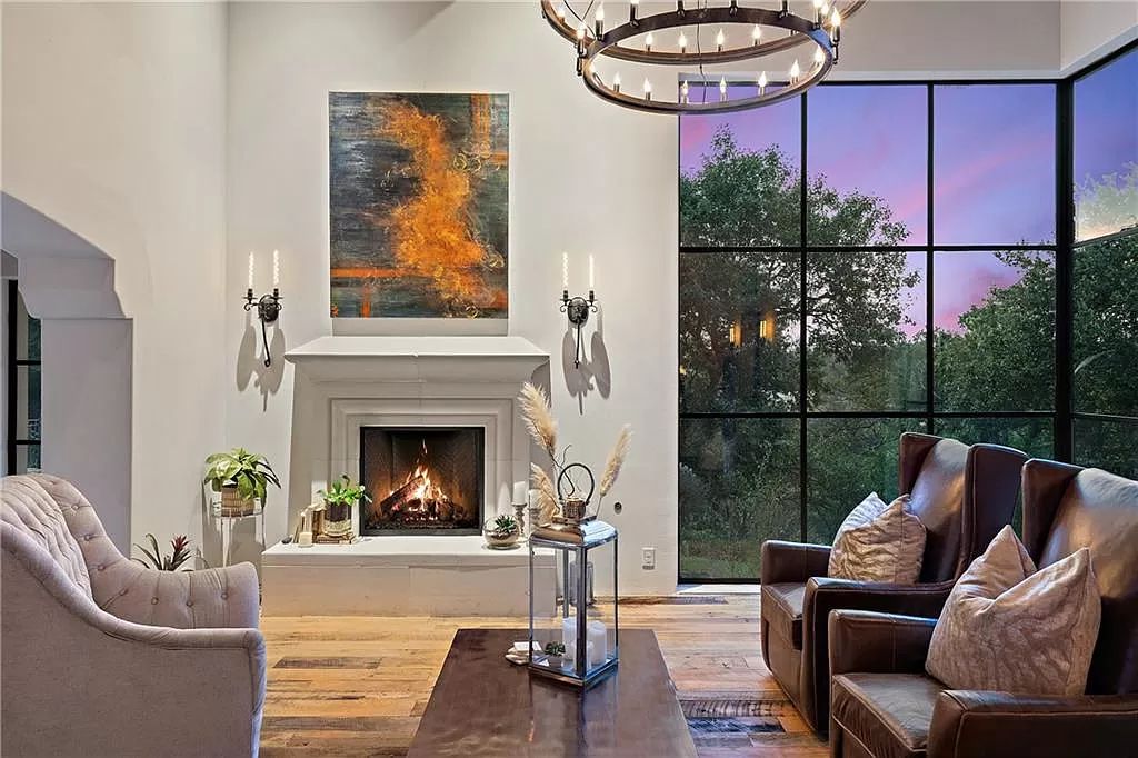 The Home in Austin is an incredible modern Santa Barbara resort style property with panoramic views of the hill country now available for sale. This home located at 4716 Pecan Chase, Austin, Texas