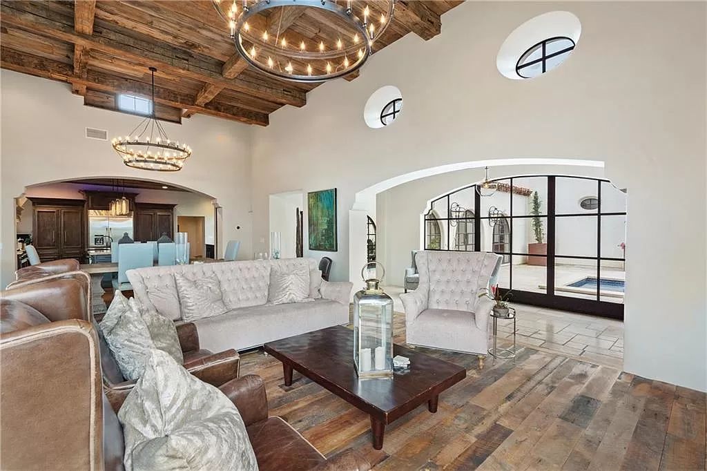 The Home in Austin is an incredible modern Santa Barbara resort style property with panoramic views of the hill country now available for sale. This home located at 4716 Pecan Chase, Austin, Texas