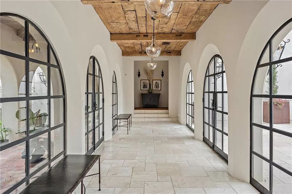 The Home in Austin is an incredible modern Santa Barbara resort style property with panoramic views of the hill country now available for sale. This home located at 4716 Pecan Chase, Austin, Texas