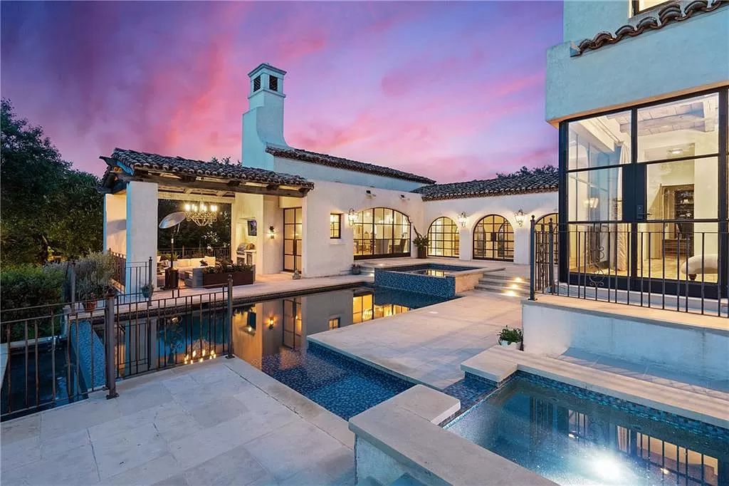 The Home in Austin is an incredible modern Santa Barbara resort style property with panoramic views of the hill country now available for sale. This home located at 4716 Pecan Chase, Austin, Texas
