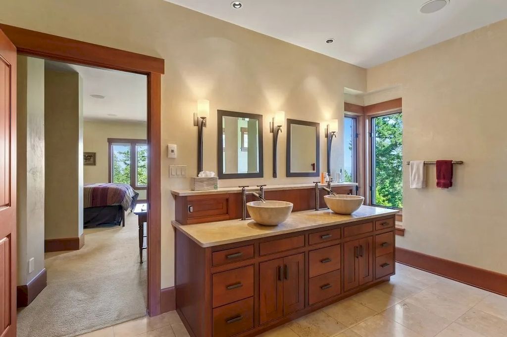 The Lookout Mountain Property is a secluded residence now available for sale. This home is located at 6008 W Lookout Mountain Ln, Spokane, Washington
