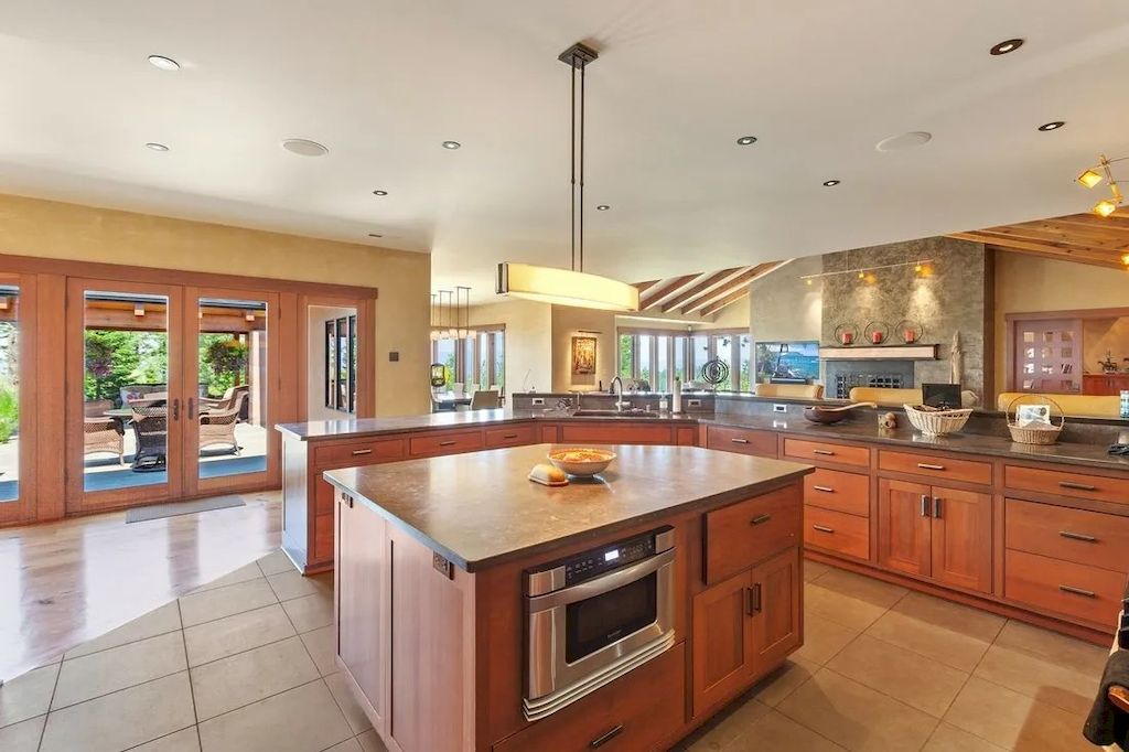 The Lookout Mountain Property is a secluded residence now available for sale. This home is located at 6008 W Lookout Mountain Ln, Spokane, Washington