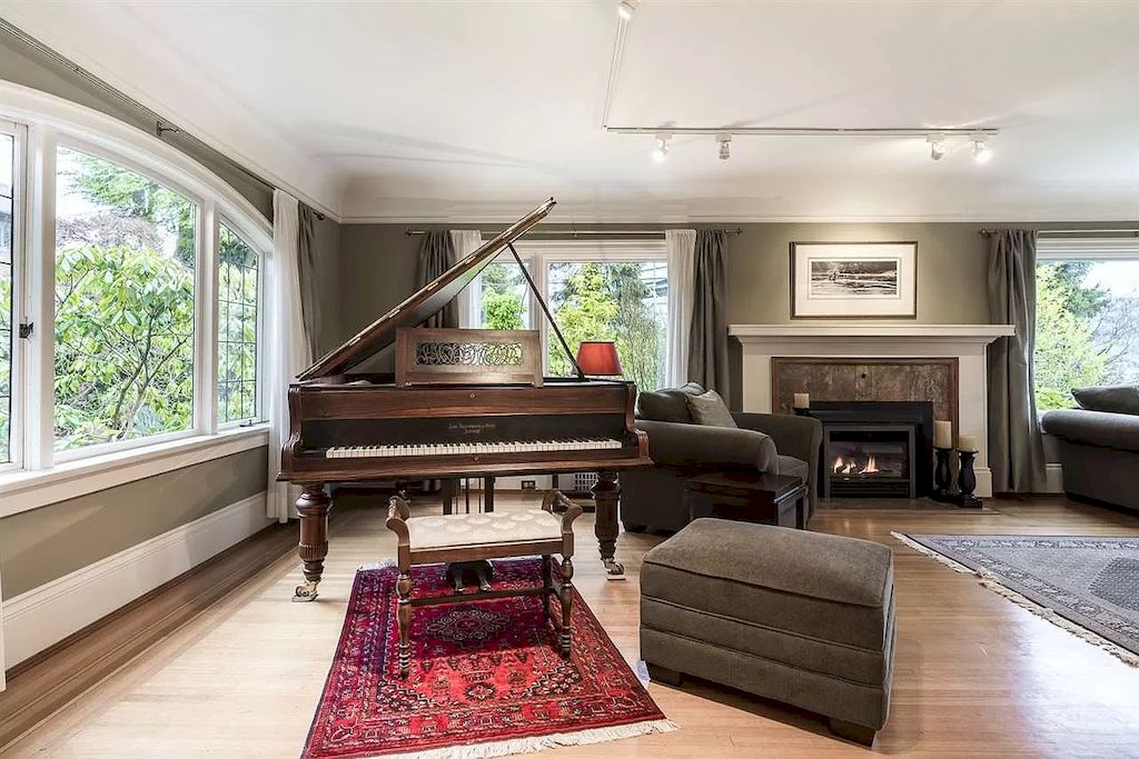 The Lovely House in Vancouver is surrounded by incredible gardens now available for sale. This home is located at 2588 Courtenay St, Vancouver, BC V6R 3X3, Canada