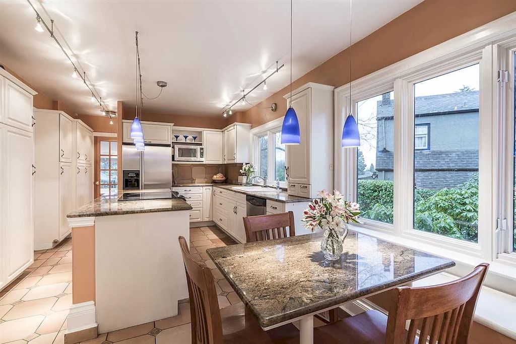 The Lovely House in Vancouver is surrounded by incredible gardens now available for sale. This home is located at 2588 Courtenay St, Vancouver, BC V6R 3X3, Canada