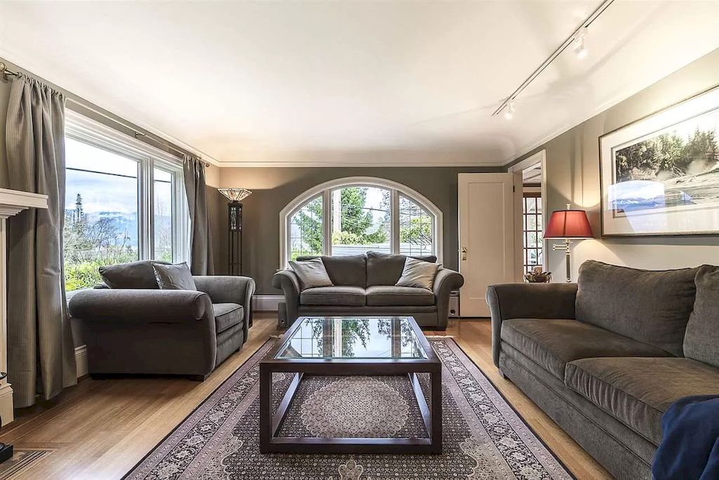 The Lovely House in Vancouver is surrounded by incredible gardens now available for sale. This home is located at 2588 Courtenay St, Vancouver, BC V6R 3X3, Canada