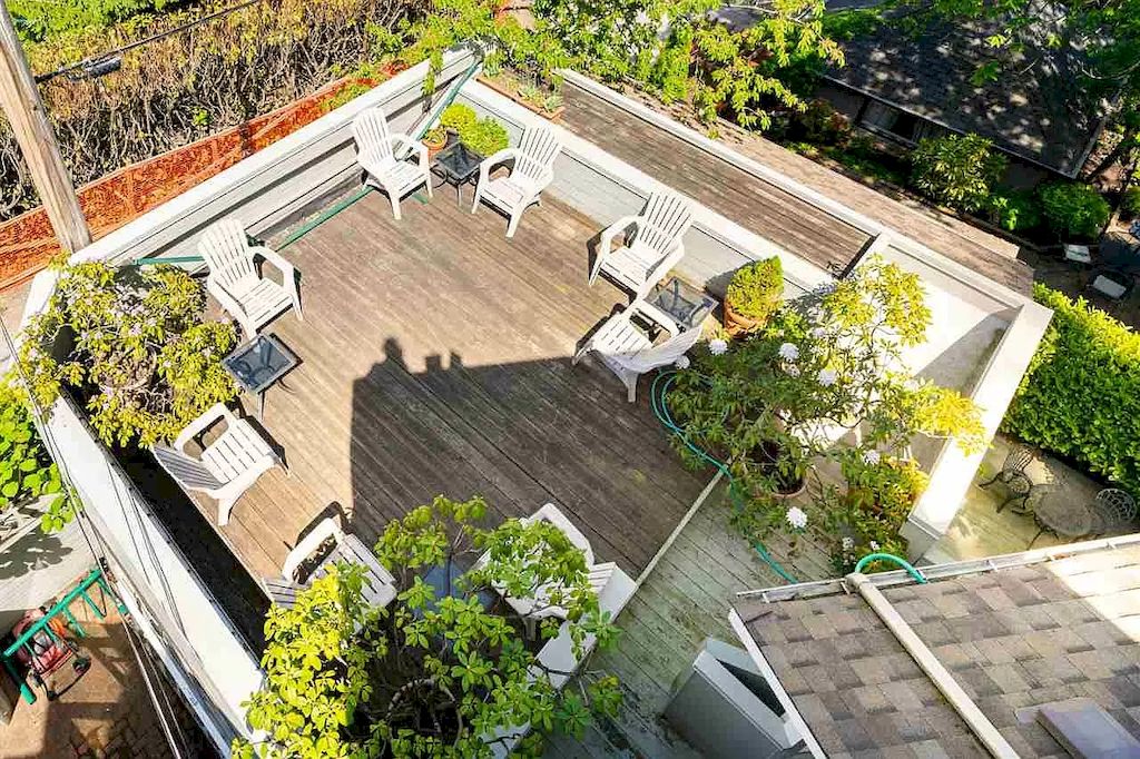 The Lovely House in Vancouver is surrounded by incredible gardens now available for sale. This home is located at 2588 Courtenay St, Vancouver, BC V6R 3X3, Canada