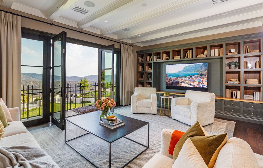 The French Mansion in California is a magnificent modern estate perched in the prestigious double-gated Estates at The Oaks of Calabasas now available for sale. This home located at 25314 Prado De La Felicidad, Calabasas, California