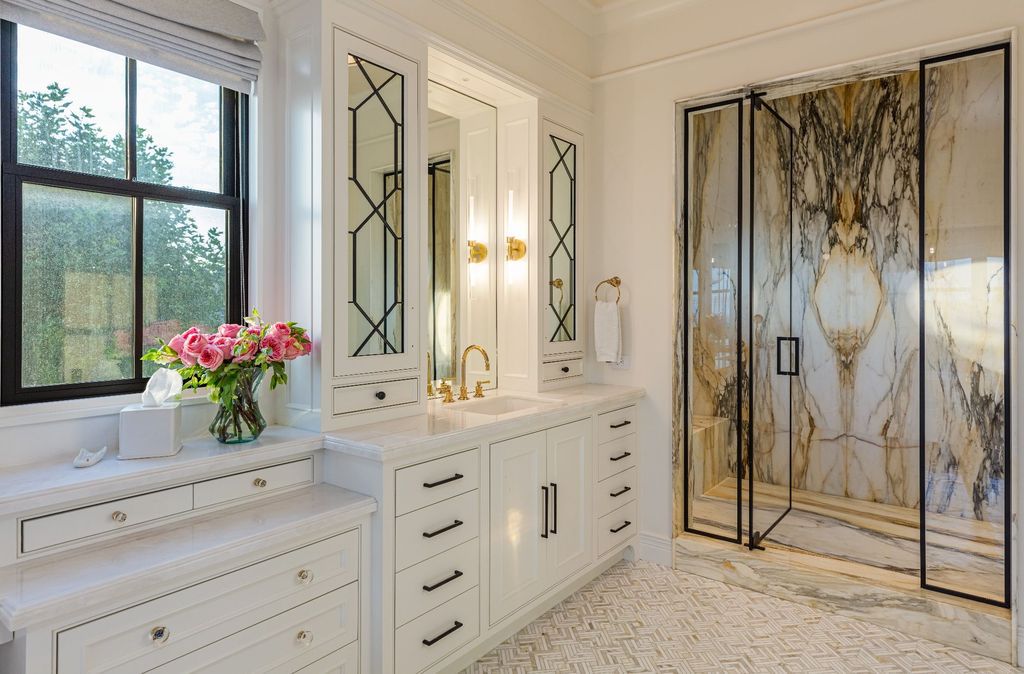 The French Mansion in California is a magnificent modern estate perched in the prestigious double-gated Estates at The Oaks of Calabasas now available for sale. This home located at 25314 Prado De La Felicidad, Calabasas, California
