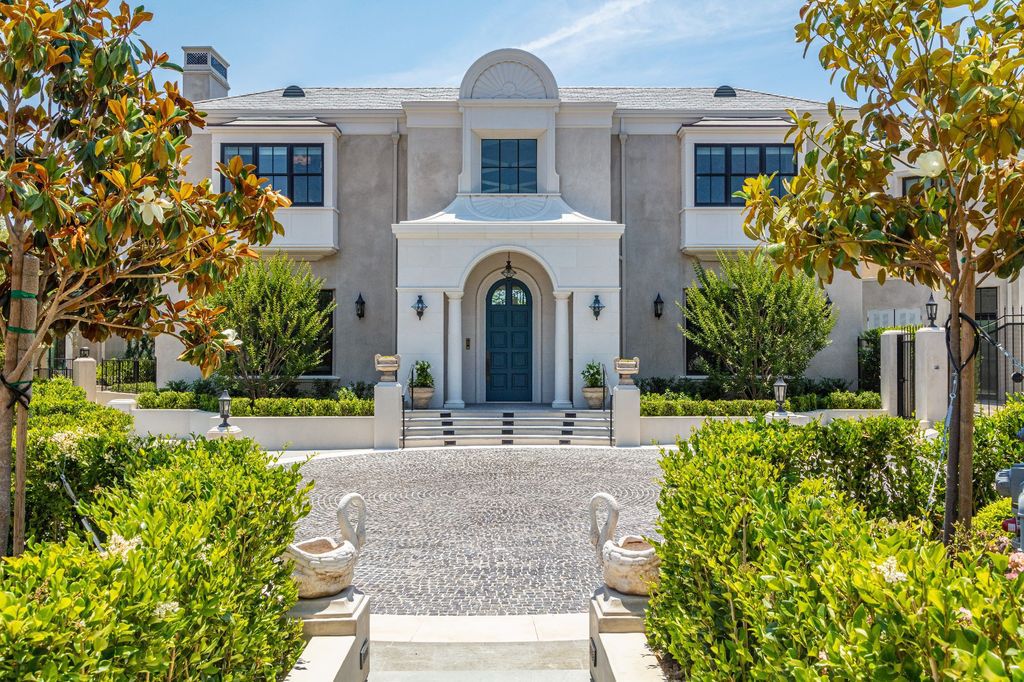 The French Mansion in California is a magnificent modern estate perched in the prestigious double-gated Estates at The Oaks of Calabasas now available for sale. This home located at 25314 Prado De La Felicidad, Calabasas, California