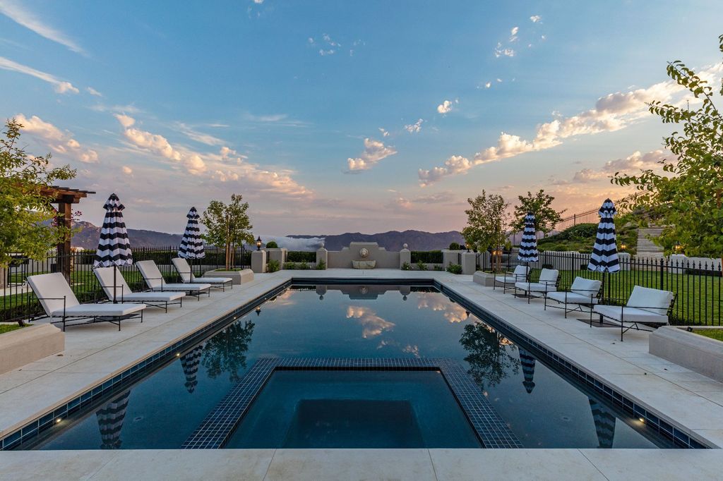 The French Mansion in California is a magnificent modern estate perched in the prestigious double-gated Estates at The Oaks of Calabasas now available for sale. This home located at 25314 Prado De La Felicidad, Calabasas, California