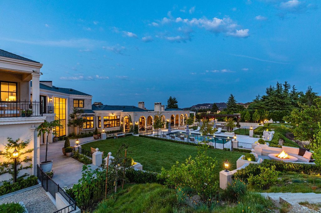 The French Mansion in California is a magnificent modern estate perched in the prestigious double-gated Estates at The Oaks of Calabasas now available for sale. This home located at 25314 Prado De La Felicidad, Calabasas, California