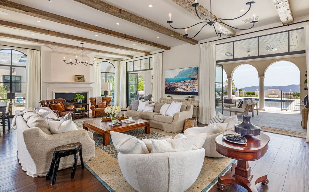 The French Mansion in California is a magnificent modern estate perched in the prestigious double-gated Estates at The Oaks of Calabasas now available for sale. This home located at 25314 Prado De La Felicidad, Calabasas, California