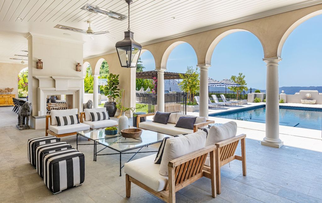 The French Mansion in California is a magnificent modern estate perched in the prestigious double-gated Estates at The Oaks of Calabasas now available for sale. This home located at 25314 Prado De La Felicidad, Calabasas, California