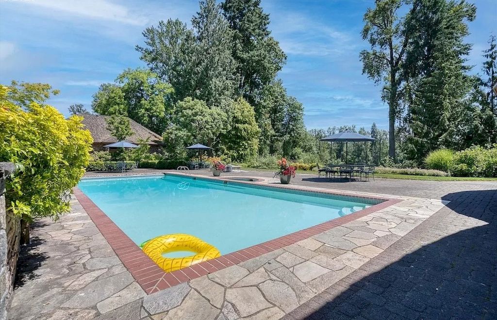 The One-of-a-Kind English Manor in Oregon combines prestigious entertaining areas with comfortable spaces now available for sale. This home is located at 2890 SW Riverfront Ter, Wilsonville, Oregon