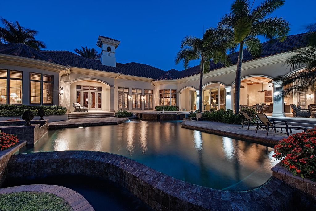 The Home in Naples is a luxurious custom built residence on one of the most sought after streets in Grey Oaks now available for sale. This home located at 2148 Canna Way, Naples, Florida