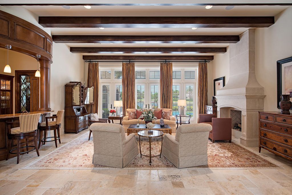 The Home in Naples is a luxurious custom built residence on one of the most sought after streets in Grey Oaks now available for sale. This home located at 2148 Canna Way, Naples, Florida