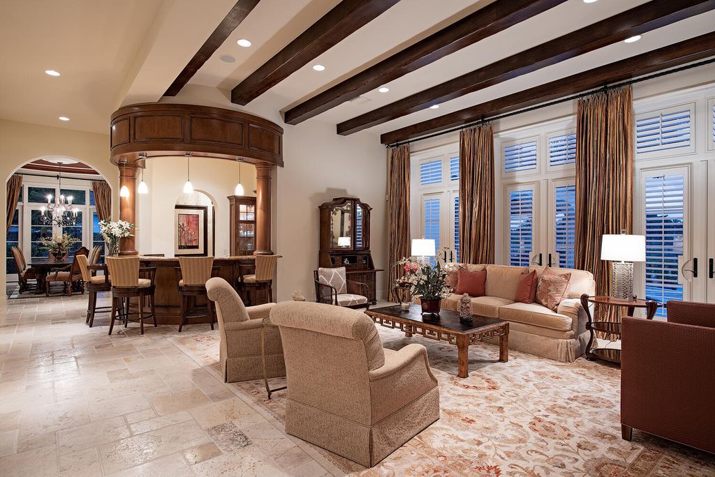 The Home in Naples is a luxurious custom built residence on one of the most sought after streets in Grey Oaks now available for sale. This home located at 2148 Canna Way, Naples, Florida