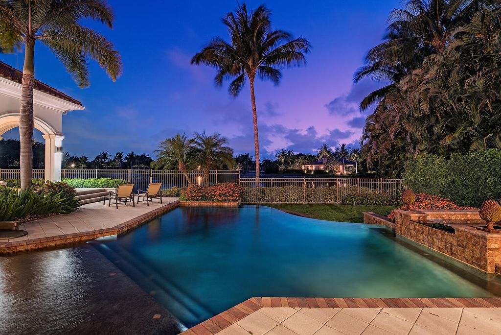 The Home in Naples is a luxurious custom built residence on one of the most sought after streets in Grey Oaks now available for sale. This home located at 2148 Canna Way, Naples, Florida