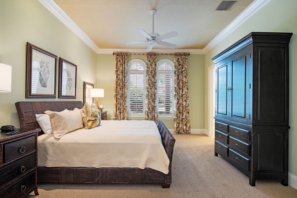 The Home in Naples is a luxurious custom built residence on one of the most sought after streets in Grey Oaks now available for sale. This home located at 2148 Canna Way, Naples, Florida